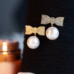 BOW TIE PEARL EARRING - Image 1