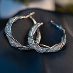 HEART HOOP SILVER EARRING - Image 1